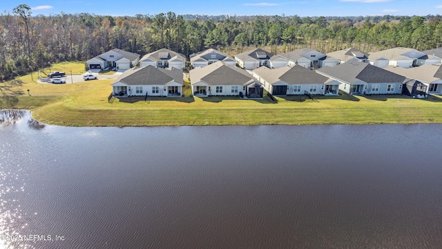 bird's eye view with a water view