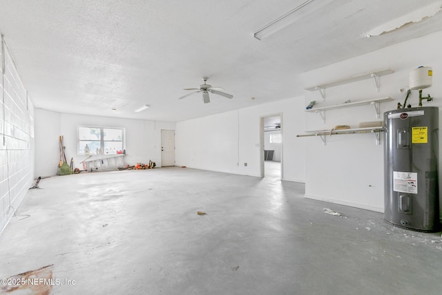 garage with ceiling fan and electric water heater