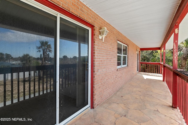 balcony featuring a porch