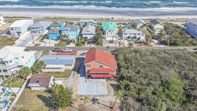 aerial view featuring a beach view and a water view