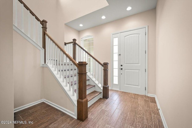 entryway featuring a healthy amount of sunlight and hardwood / wood-style flooring