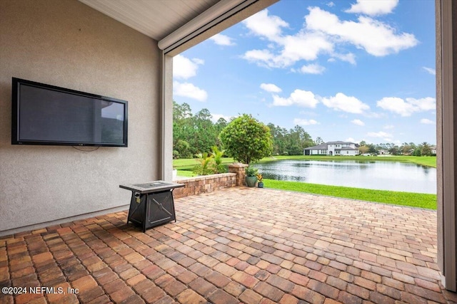 view of patio featuring a water view