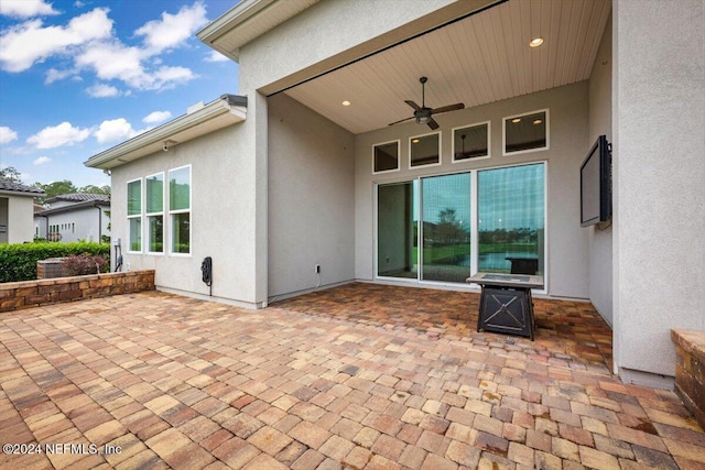 view of patio with ceiling fan