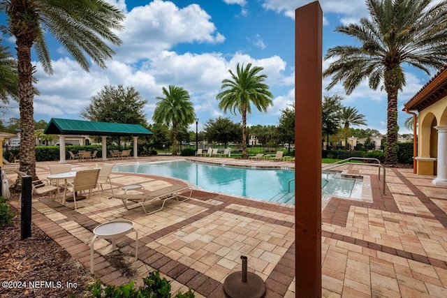 view of pool featuring a gazebo and a patio