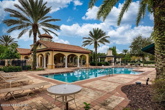 view of swimming pool featuring a patio