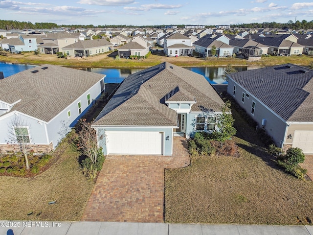 drone / aerial view featuring a water view