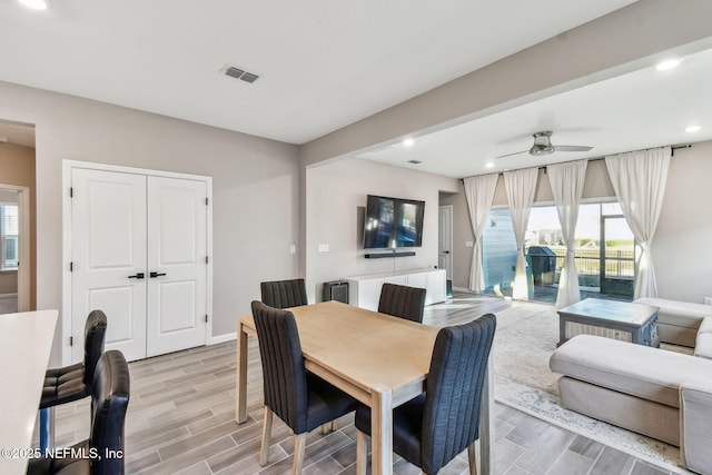 dining area with ceiling fan