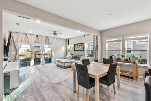 dining area with ceiling fan