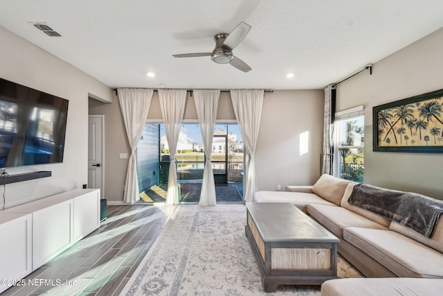 living room featuring ceiling fan