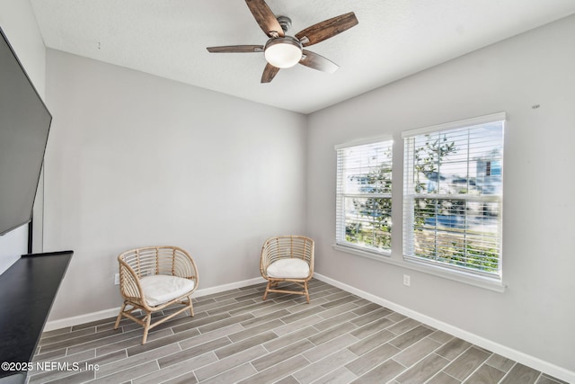 unfurnished room with ceiling fan and light hardwood / wood-style floors