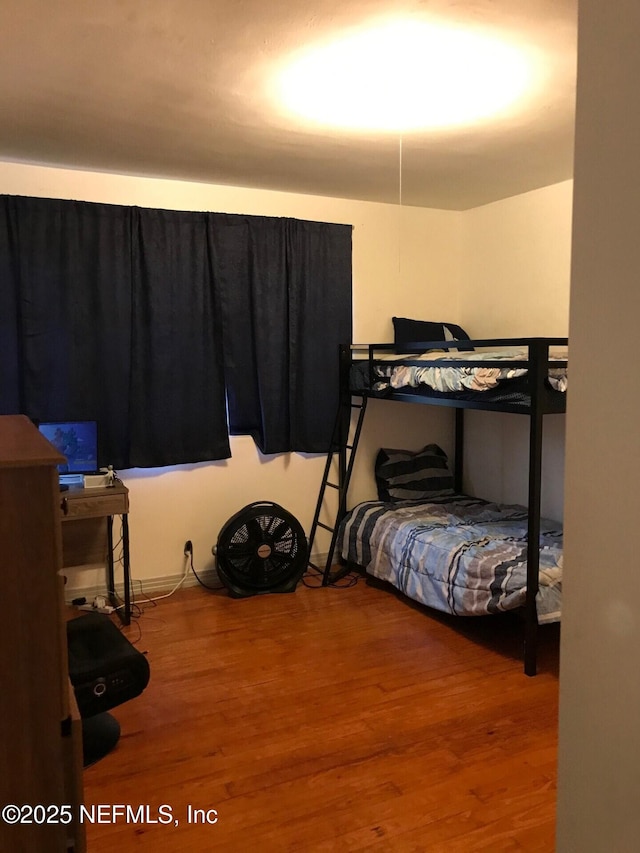 bedroom featuring hardwood / wood-style floors