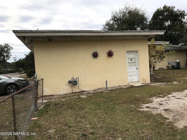 exterior space with a yard