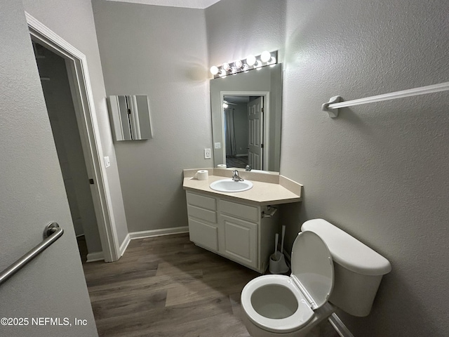 7801 Point Meadows Dr Unit 1101, Jacksonville, FL 32256 - bathroom with hardwood / wood-style flooring, vanity, and toilet