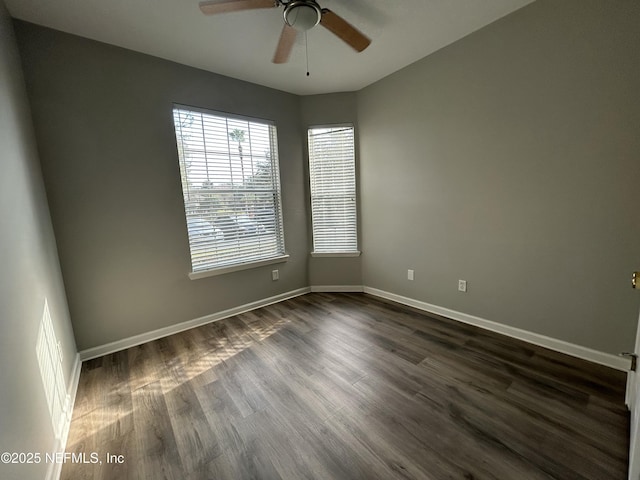 7801 Point Meadows Dr Unit 1101, Jacksonville, FL 32256 - empty room featuring ceiling fan and dark hardwood / wood-style flooring