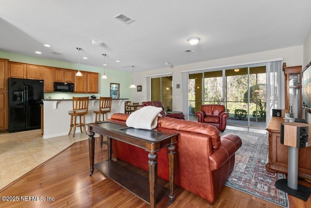 living room with light wood-type flooring