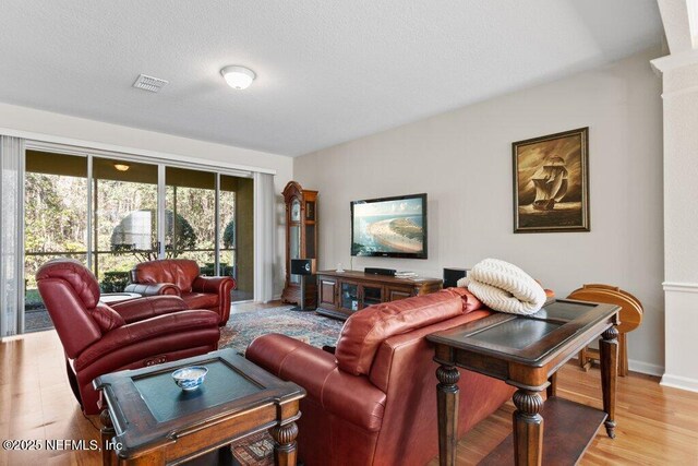 living room with light wood-type flooring