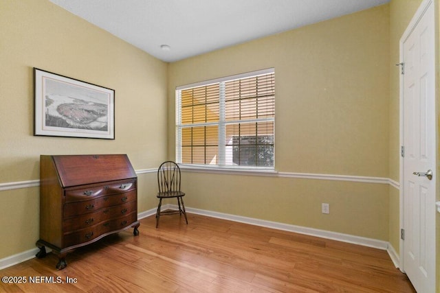 sitting room with light hardwood / wood-style floors