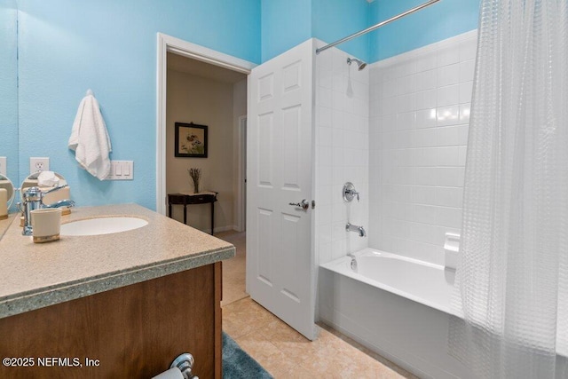 bathroom featuring tile patterned floors, shower / bath combo, and vanity