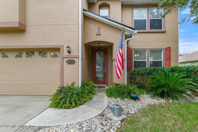 entrance to property featuring a garage