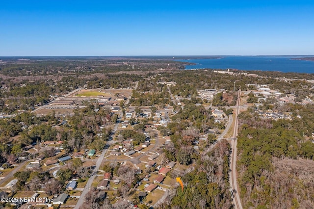 aerial view with a residential view and a water view