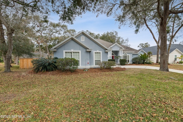 view of front facade with a front yard