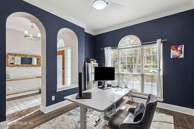 office area with a textured ceiling, dark hardwood / wood-style floors, crown molding, and ceiling fan with notable chandelier