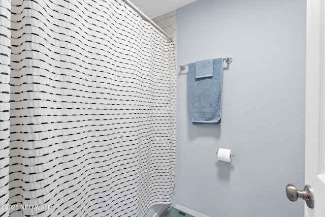 bathroom with walk in shower