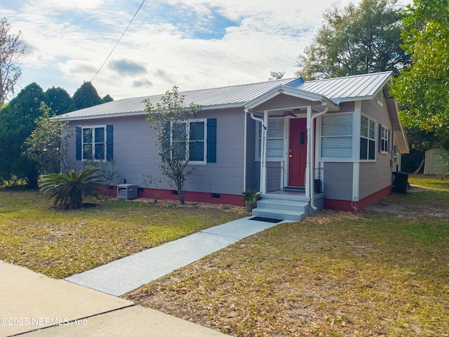 view of front of home featuring a front yard