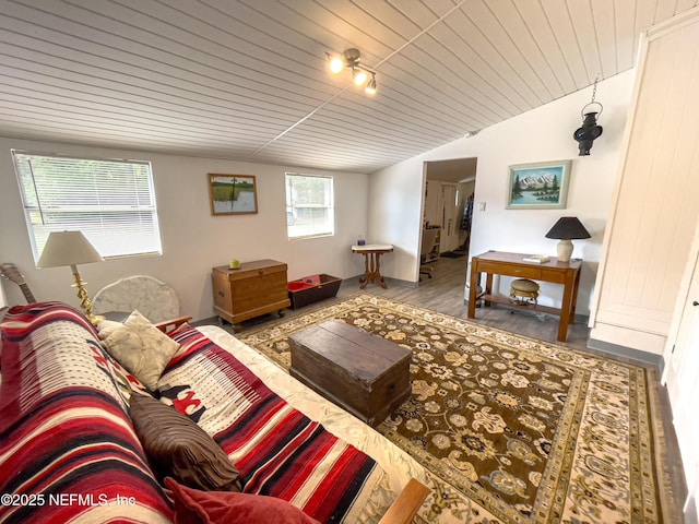 living room with hardwood / wood-style floors, lofted ceiling, and wood ceiling