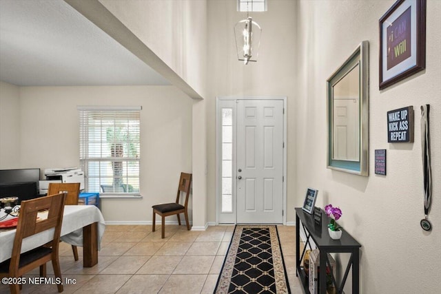 foyer with light tile patterned floors