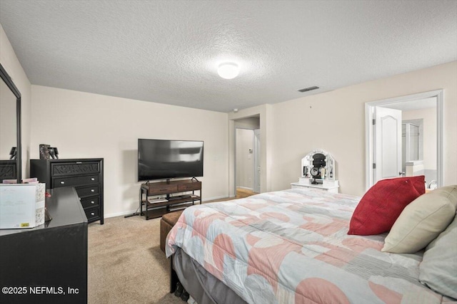 carpeted bedroom with a textured ceiling