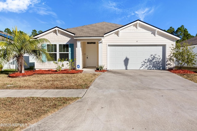 ranch-style home featuring a garage