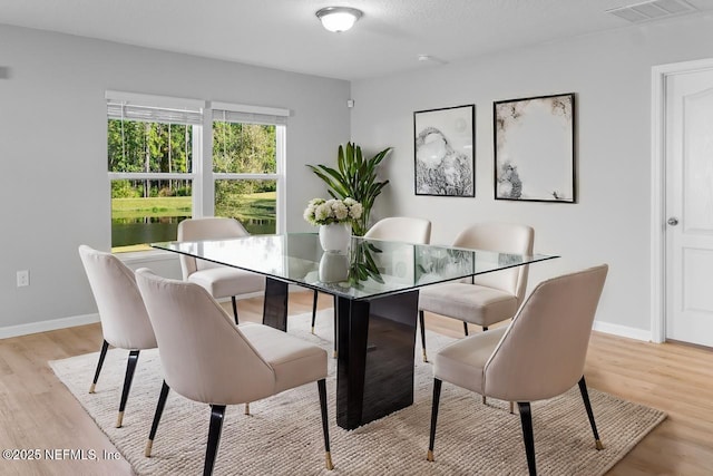 dining area featuring light hardwood / wood-style flooring