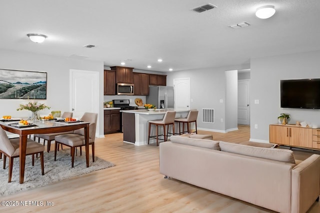 living room featuring light hardwood / wood-style flooring