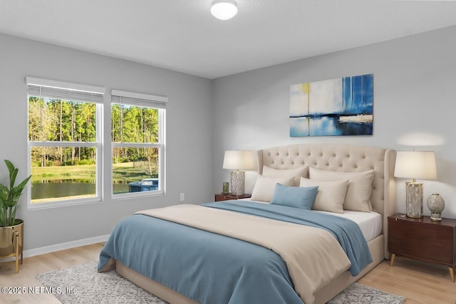 bedroom featuring light wood-type flooring