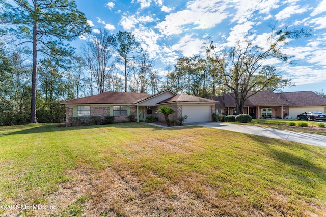 ranch-style home featuring a front yard and a garage