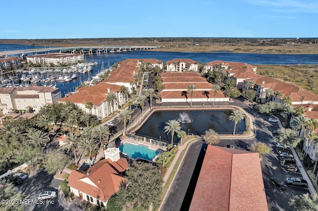 drone / aerial view with a water view