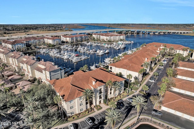 drone / aerial view with a water view