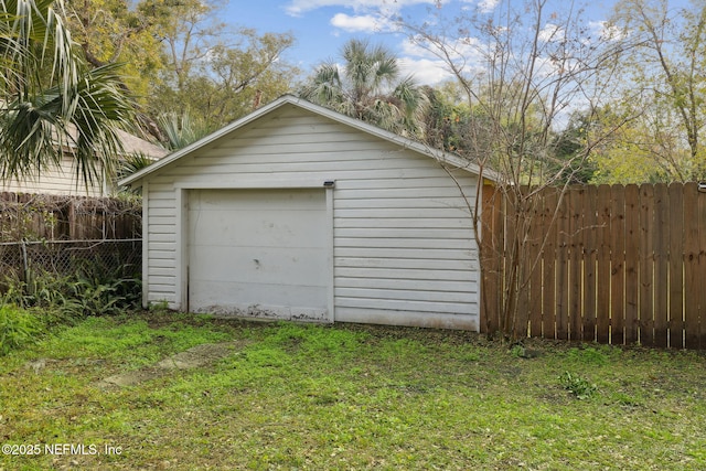 garage with a yard