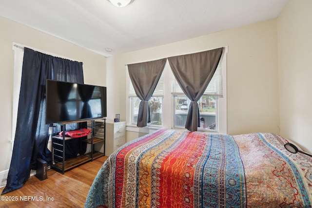 bedroom featuring light hardwood / wood-style flooring