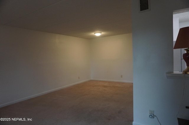 spare room with carpet flooring