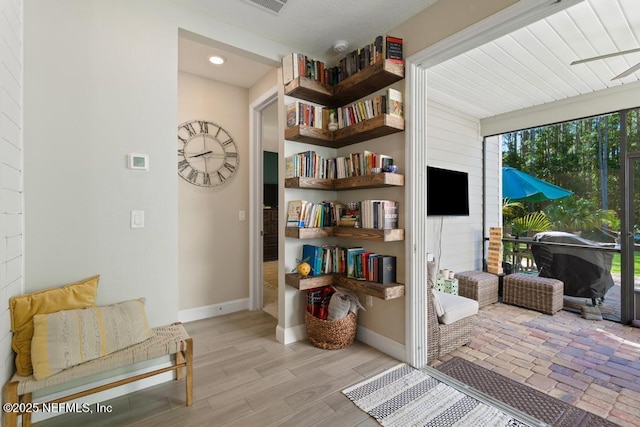 living area featuring light wood-type flooring