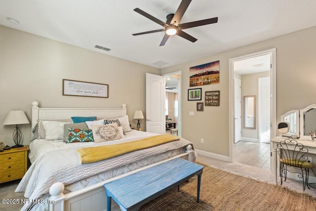 bedroom featuring baseboards, visible vents, and a ceiling fan