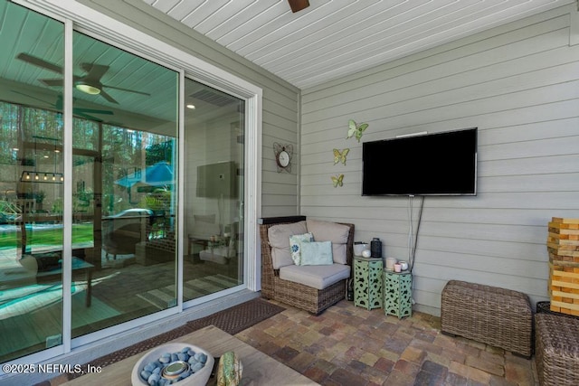 view of patio / terrace featuring ceiling fan