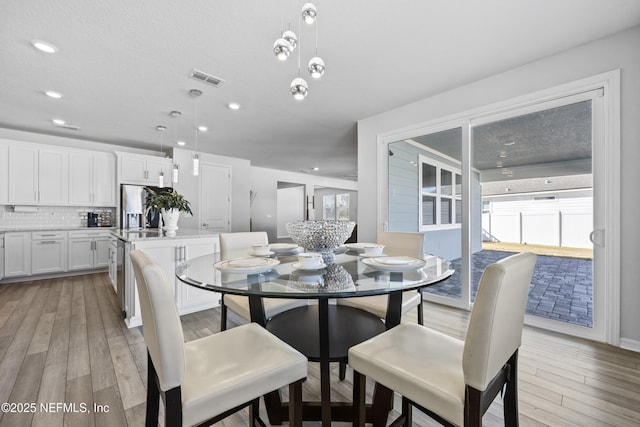 dining area featuring light hardwood / wood-style flooring