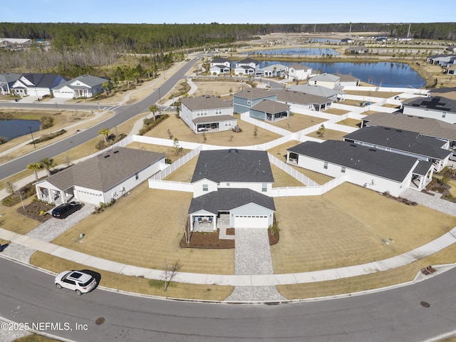 drone / aerial view featuring a water view