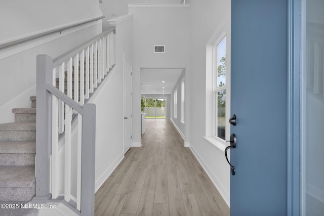374 Sutton Dr, Ponte Vedra, FL 32081 - entryway with light wood finished floors and stairway