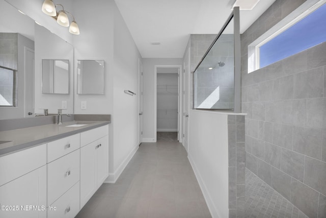 374 Sutton Dr, Ponte Vedra, FL 32081 - full bathroom with vanity, a walk in shower, and a spacious closet