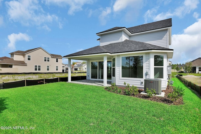 374 Sutton Dr, Ponte Vedra, FL 32081 - rear view of house with a shingled roof and a patio