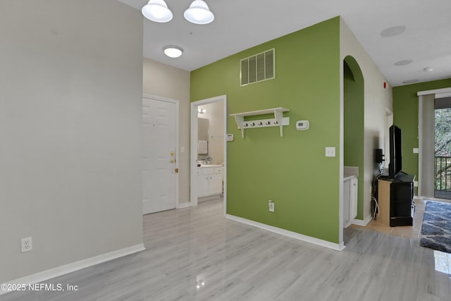 hall featuring light hardwood / wood-style floors